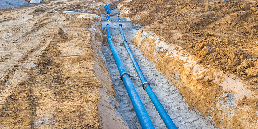 Construction site with new Water Pipes in the ground